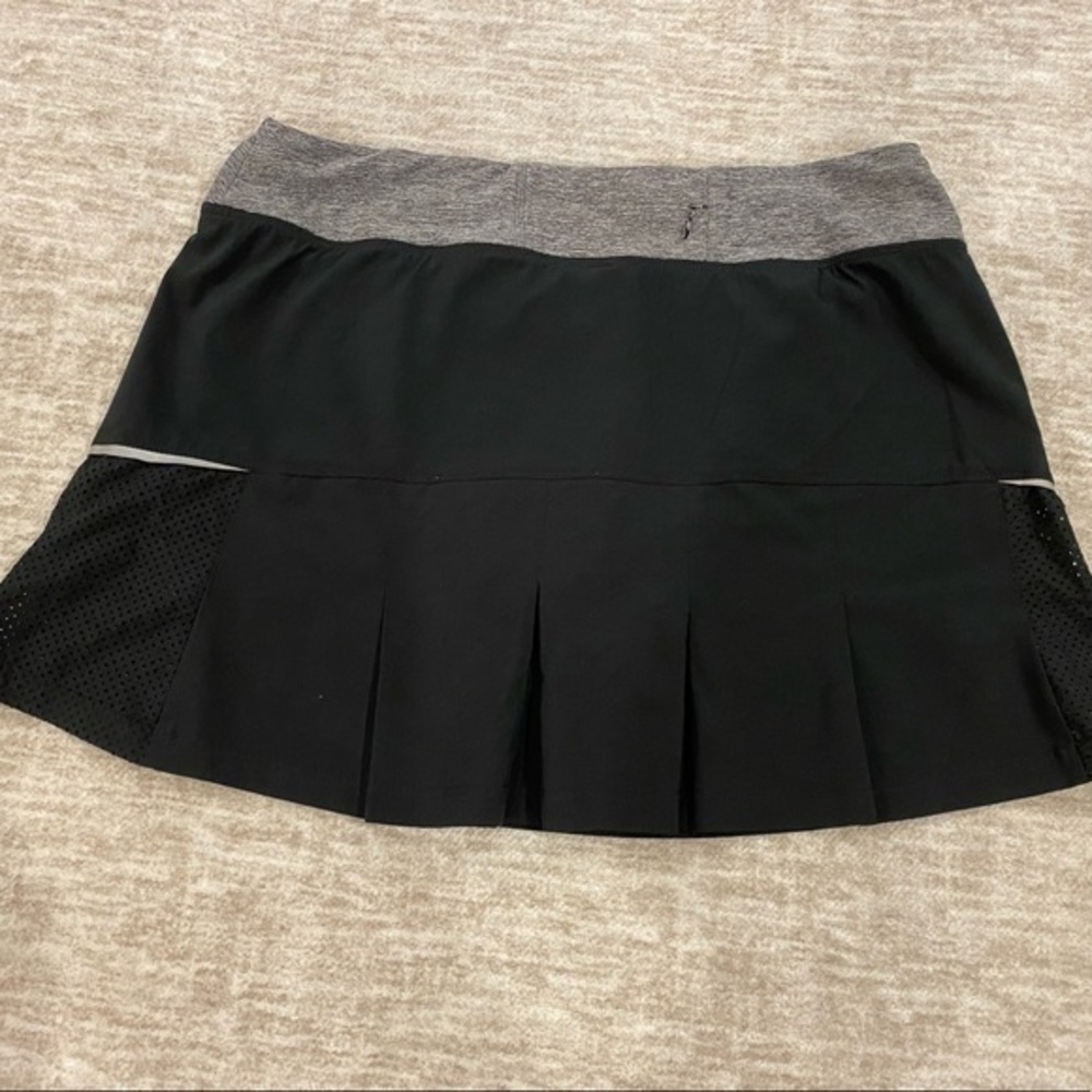 Champion women’s black and gray athletic skort with zip pocket size medium